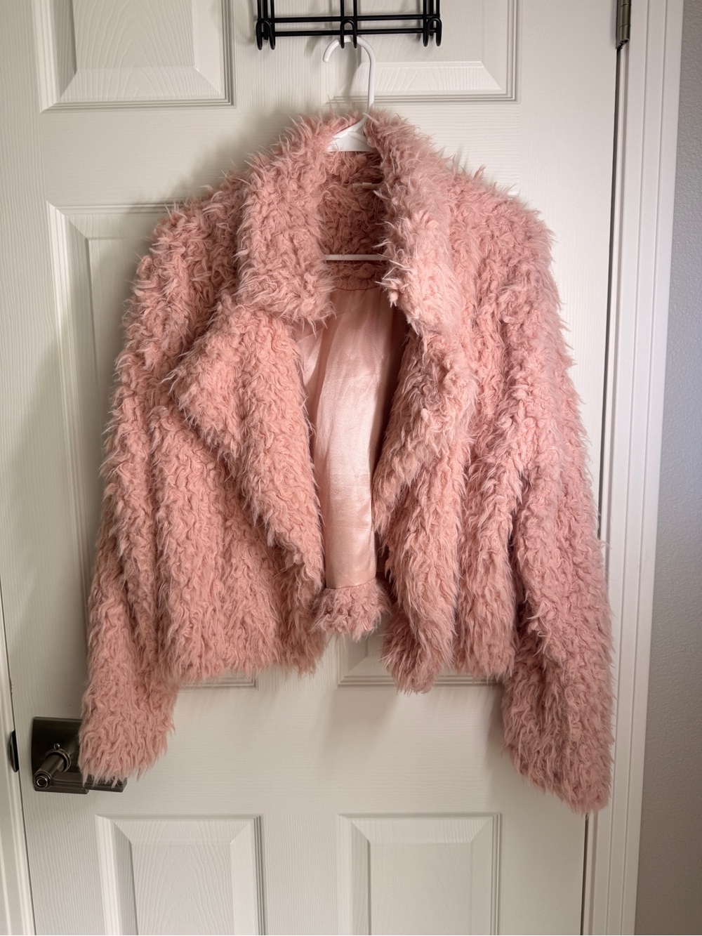 Pink fuzzy open front coat